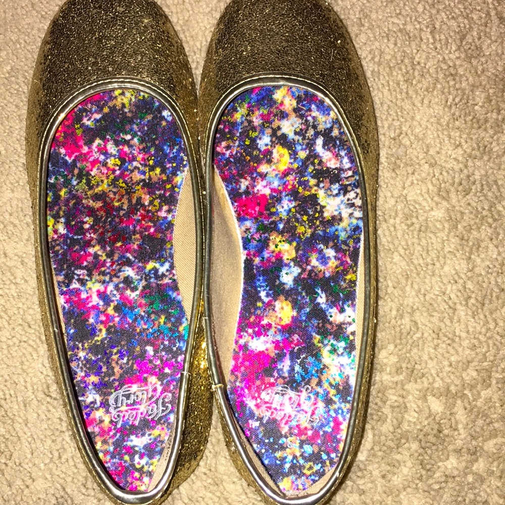 Flats with gold and a colorful pattern